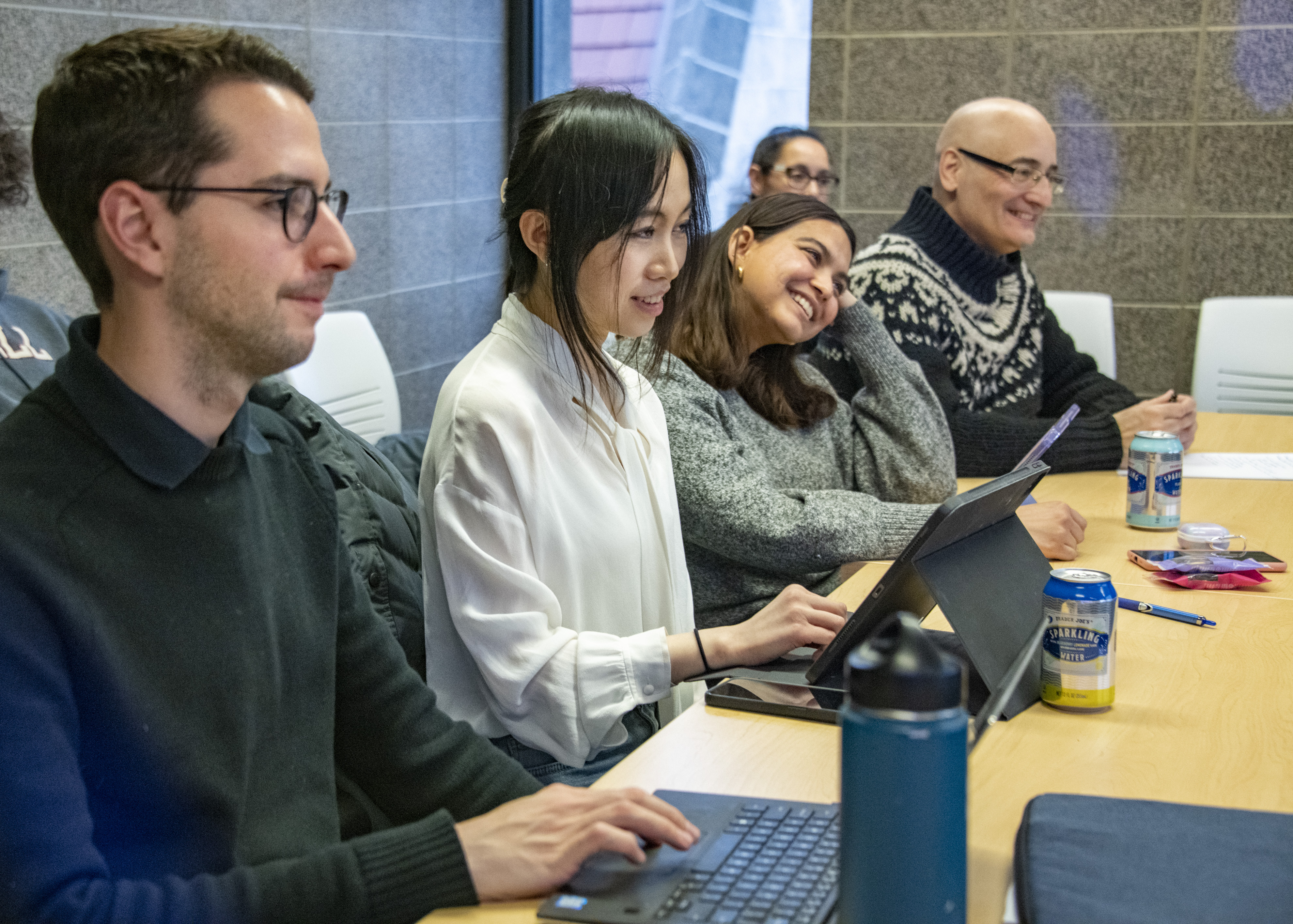 A photograph of UChicago Political Science students engaged in a class