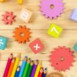 Colorful pencils, blocks and gears