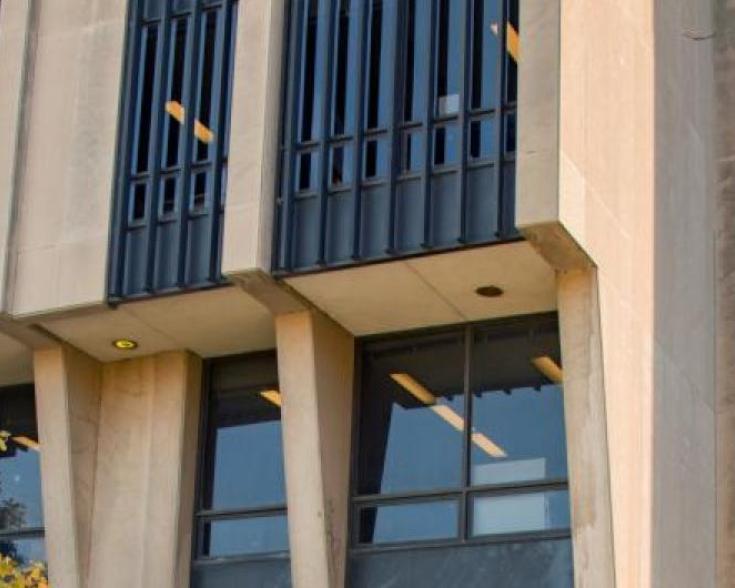 Brown building with lots of windows